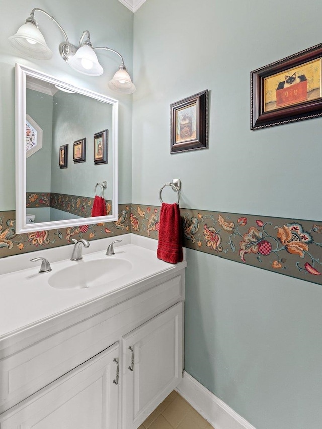 bathroom with tile patterned flooring and vanity