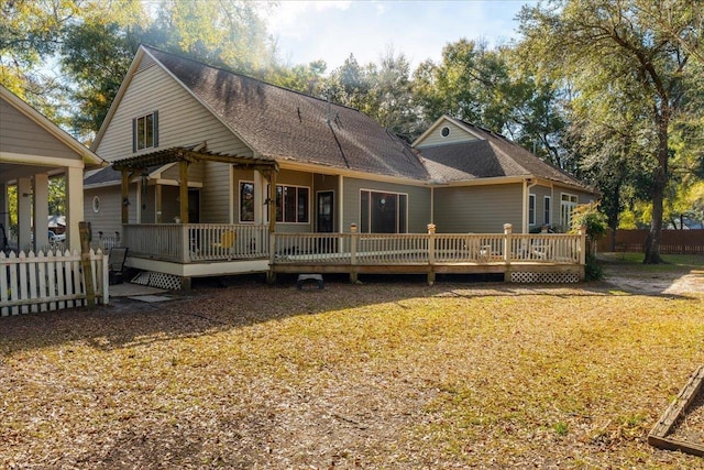 view of front of house featuring a deck and a pergola