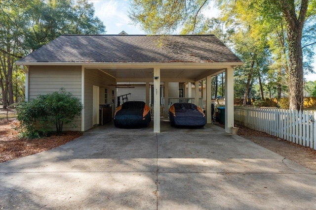 view of parking with a carport