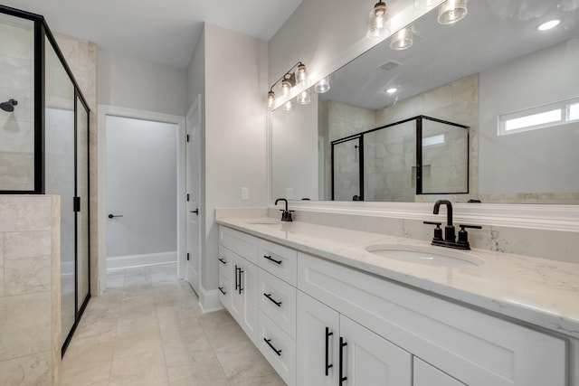 bathroom with visible vents, a sink, marble finish floor, and a stall shower