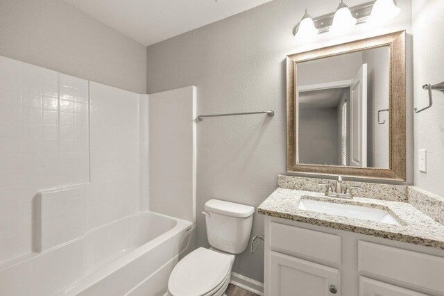 full bathroom featuring vanity, toilet, and shower / washtub combination