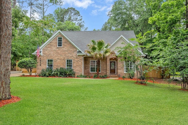 1639 Chadwick Way, Tallahassee, FL 32312 - view of front of home with brick siding and a shingled roof