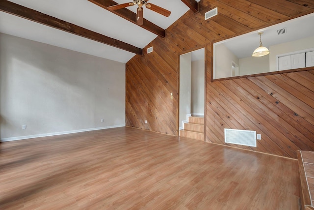3508 Willow Springs Ln, Tallahassee, FL 32312 - unfurnished living room with wooden walls, a ceiling fan, wood finished floors, and stairway