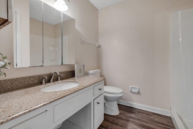 3508 Willow Springs Ln, Tallahassee, FL 32312 - full bath with vanity, a shower, and wood finished floors
