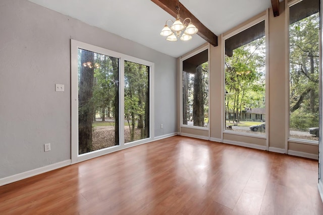 3508 Willow Springs Ln, Tallahassee, FL 32312 - unfurnished room featuring beamed ceiling, a chandelier, and wood finished floors