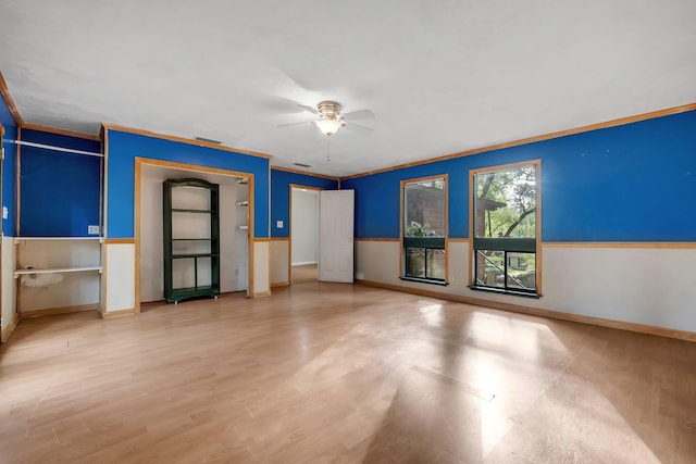 3508 Willow Springs Ln, Tallahassee, FL 32312 - unfurnished bedroom with crown molding, light wood-style floors, and a ceiling fan