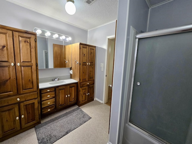 2612 W Tharpe St, Tallahassee, FL 32303 - full bath featuring a shower with door, vanity, a textured ceiling, and crown molding
