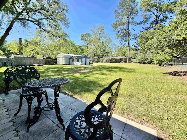 2612 W Tharpe St, Tallahassee, FL 32303 - fenced backyard with a shed and a patio