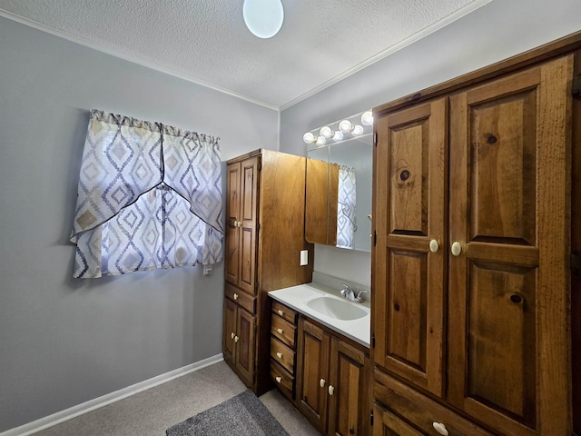 2612 W Tharpe St, Tallahassee, FL 32303 - bathroom with vanity, a textured ceiling, and crown molding