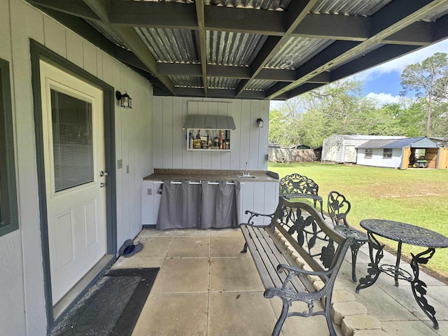 2612 W Tharpe St, Tallahassee, FL 32303 - view of patio with an outdoor structure and a sink