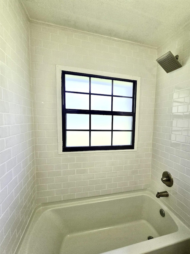 2612 W Tharpe St, Tallahassee, FL 32303 - full bathroom with a textured ceiling and  shower combination