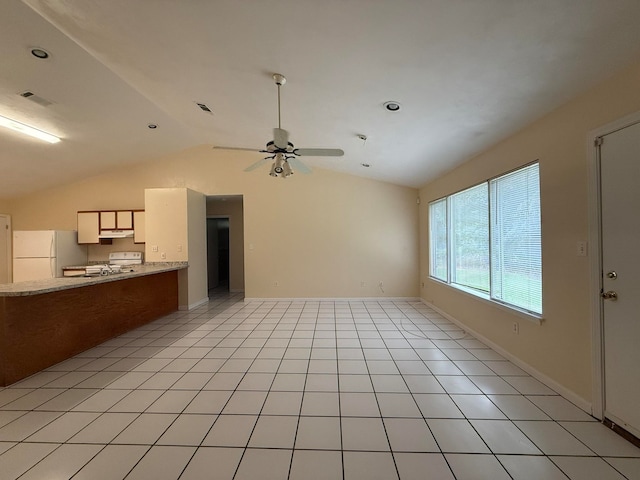 unfurnished living room featuring light tile patterned floors, vaulted ceiling, and ceiling fan