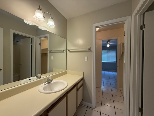 bathroom featuring vanity, tile patterned floors, and ceiling fan