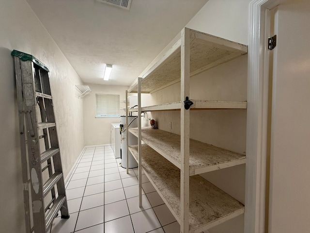 storage room with washing machine and dryer