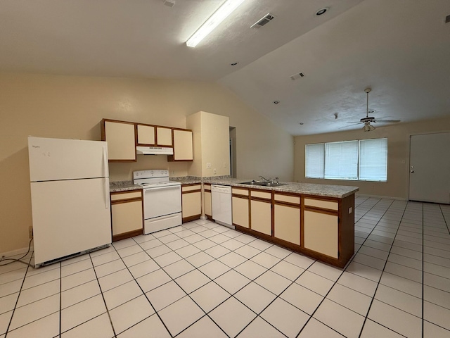 kitchen with white appliances, sink, vaulted ceiling, ceiling fan, and kitchen peninsula