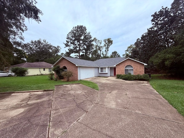 single story home featuring a garage and a front yard