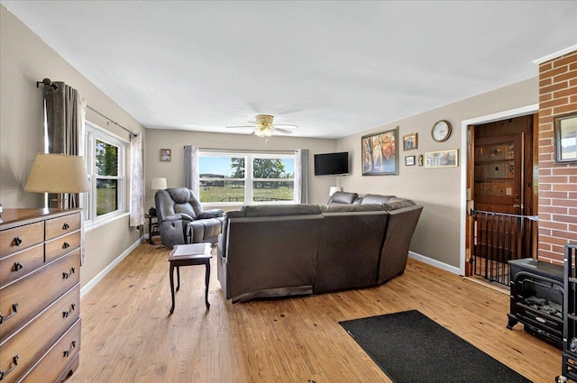 5975 Mount Pleasant Rd, Quincy, FL 32352 - living area with light wood finished floors, ceiling fan, and baseboards