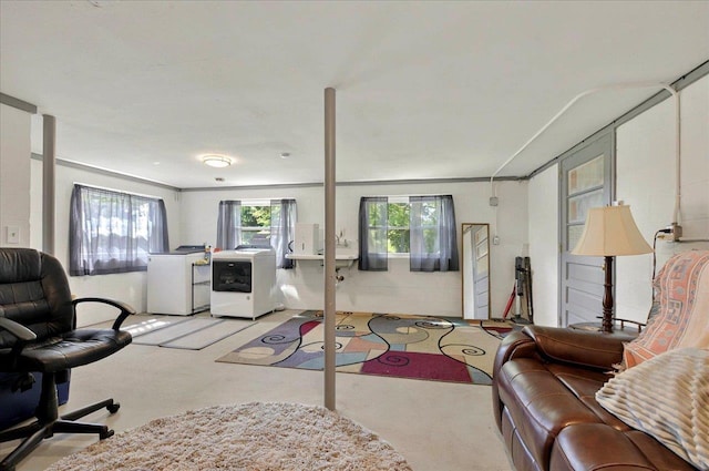 5975 Mount Pleasant Rd, Quincy, FL 32352 - living room featuring carpet and washer / dryer