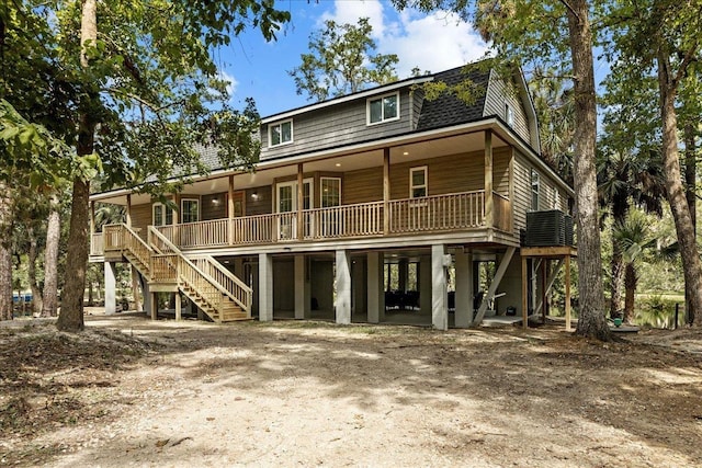 1334 Jr Howell Rd, Steinhatchee, FL 32359 - rear view of house featuring stairway