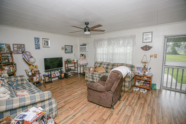 1315 S Center St Unit 1, Perry, FL 32348 - living area featuring plenty of natural light, wood finished floors, and a ceiling fan