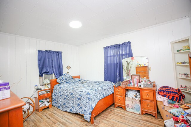1315 S Center St Unit 1, Perry, FL 32348 - bedroom with wood finished floors