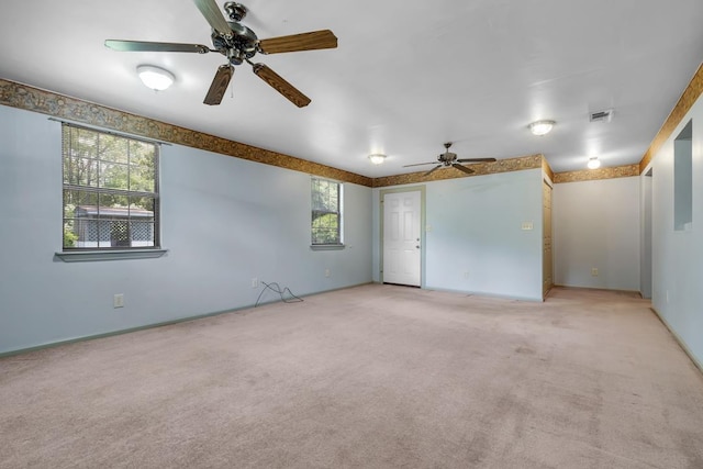 820 Essex Dr, Tallahassee, FL 32304 - empty room featuring ceiling fan, light carpet, and baseboards