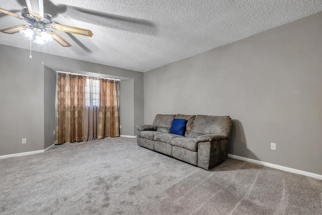 820 Essex Dr, Tallahassee, FL 32304 - carpeted living area with ceiling fan, a textured ceiling, and baseboards