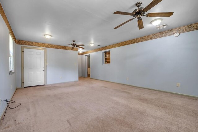 820 Essex Dr, Tallahassee, FL 32304 - empty room with light colored carpet and a ceiling fan