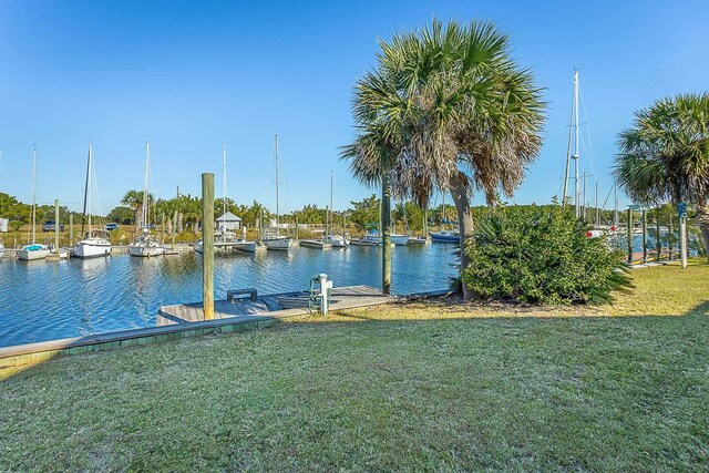 126 Royster Dr, Crawfordville, FL 32327 - dock with a lawn and a water view