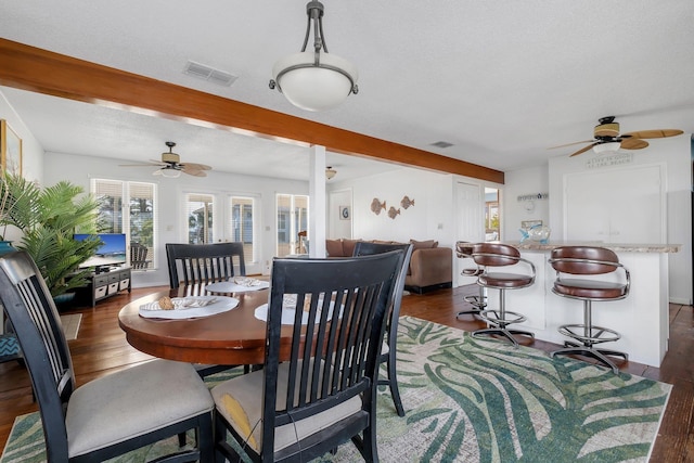 126 Royster Dr, Crawfordville, FL 32327 - dining area with a ceiling fan, healthy amount of natural light, and dark wood finished floors