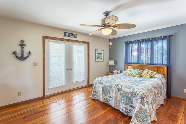 126 Royster Dr, Crawfordville, FL 32327 - bedroom featuring multiple windows, french doors, wood-type flooring, and access to outside