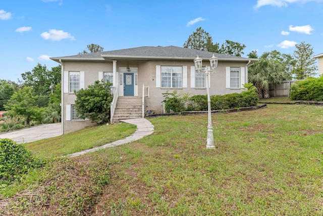 186 NW Whispering Pines Loop, Madison, FL 32340 - bungalow-style house featuring a front yard and fence