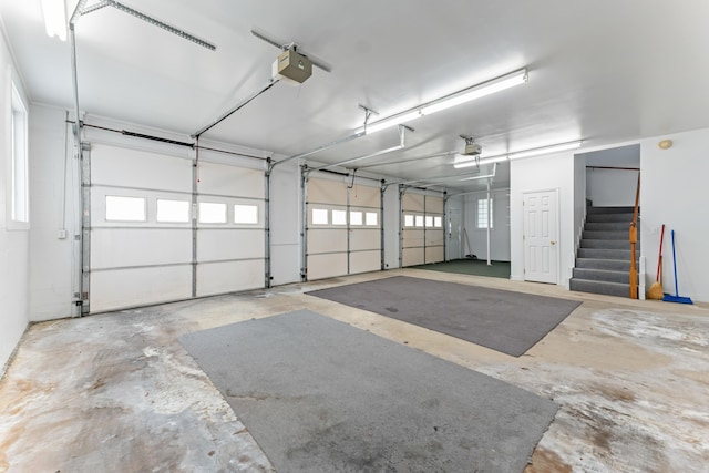 186 NW Whispering Pines Loop, Madison, FL 32340 - garage featuring a garage door opener