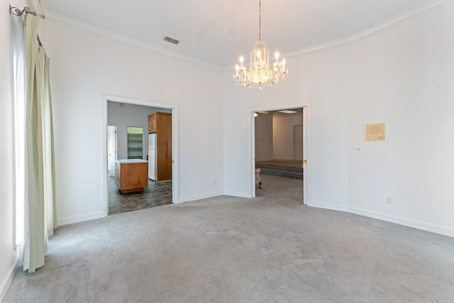 186 NW Whispering Pines Loop, Madison, FL 32340 - empty room featuring visible vents, a chandelier, crown molding, carpet flooring, and baseboards