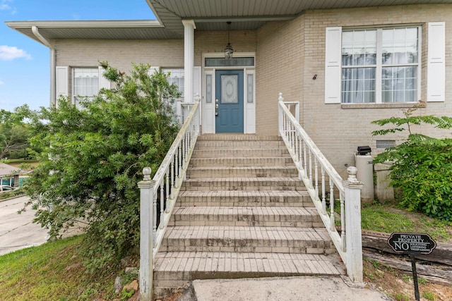 186 NW Whispering Pines Loop, Madison, FL 32340 - property entrance featuring brick siding