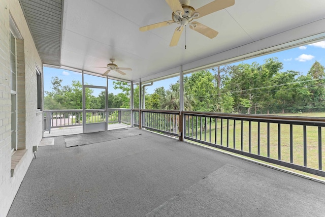 186 NW Whispering Pines Loop, Madison, FL 32340 - unfurnished sunroom featuring a ceiling fan