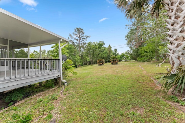 186 NW Whispering Pines Loop, Madison, FL 32340 - view of yard featuring a wooden deck