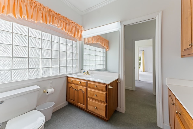 186 NW Whispering Pines Loop, Madison, FL 32340 - bathroom with toilet, ornamental molding, vanity, and baseboards