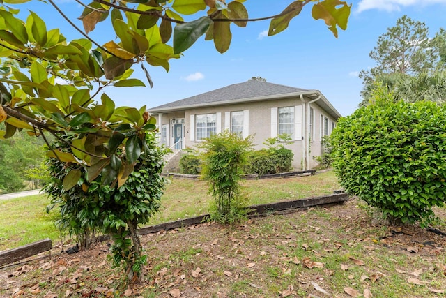 186 NW Whispering Pines Loop, Madison, FL 32340 - view of home's exterior with a lawn