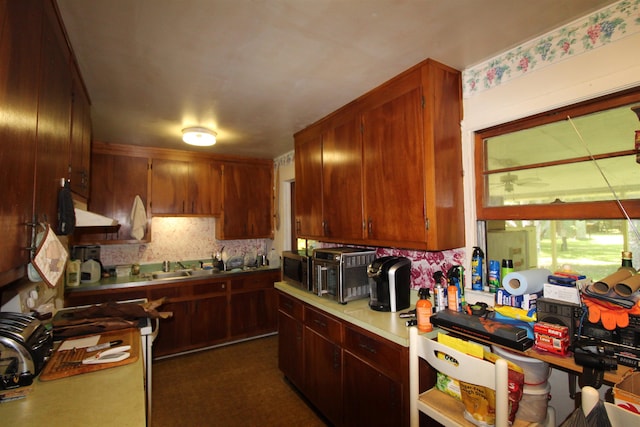30 Ace High Ln, Crawfordville, FL 32327 - kitchen featuring tasteful backsplash, light countertops, and stainless steel microwave