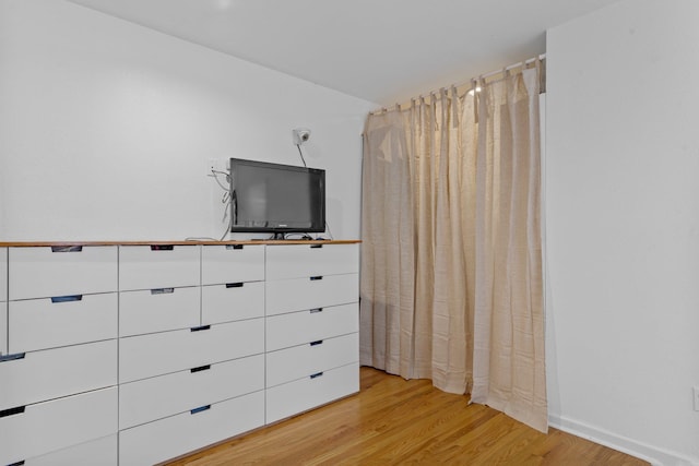 unfurnished bedroom with light hardwood / wood-style flooring