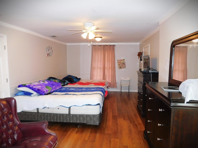 287 Tyre Rd, Havana, FL 32333 - bedroom with wood finished floors, ornamental molding, and a ceiling fan