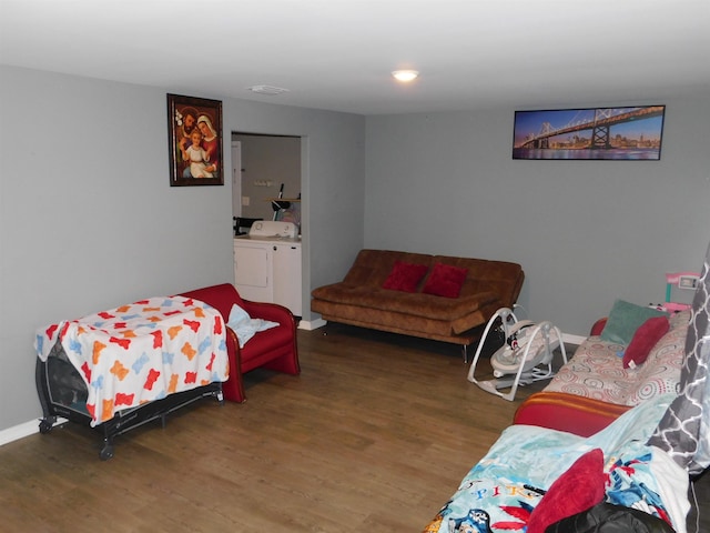287 Tyre Rd, Havana, FL 32333 - bedroom featuring separate washer and dryer and wood finished floors