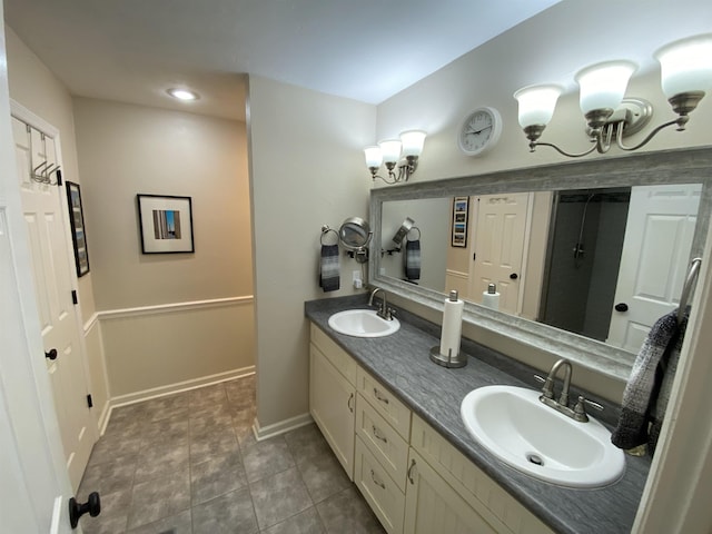 7124 Towner Trce, Tallahassee, FL 32312 - full bathroom featuring double vanity, tile patterned floors, recessed lighting, and a chandelier