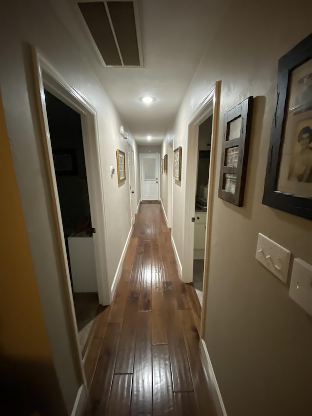 7124 Towner Trce, Tallahassee, FL 32312 - corridor featuring dark wood-style flooring and baseboards