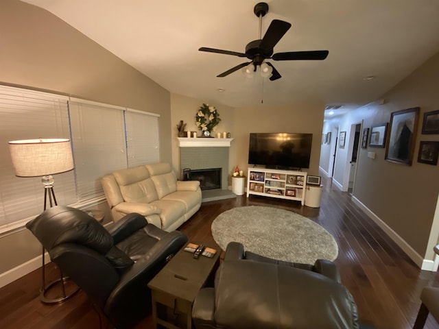 7124 Towner Trce, Tallahassee, FL 32312 - living room featuring lofted ceiling, ceiling fan, wood finished floors, and a brick fireplace