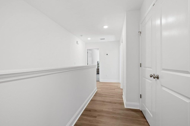 hallway featuring light hardwood / wood-style floors