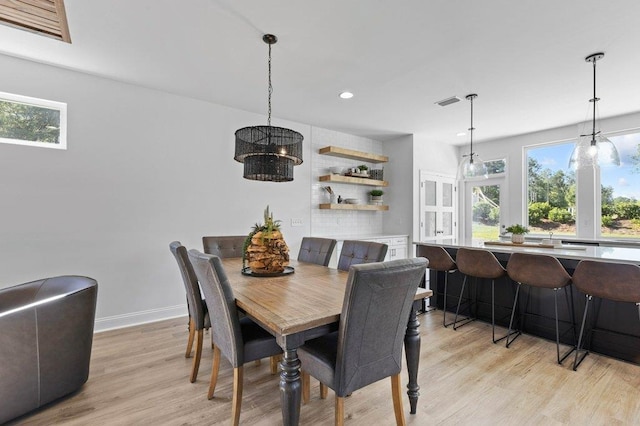 dining room featuring light hardwood / wood-style flooring