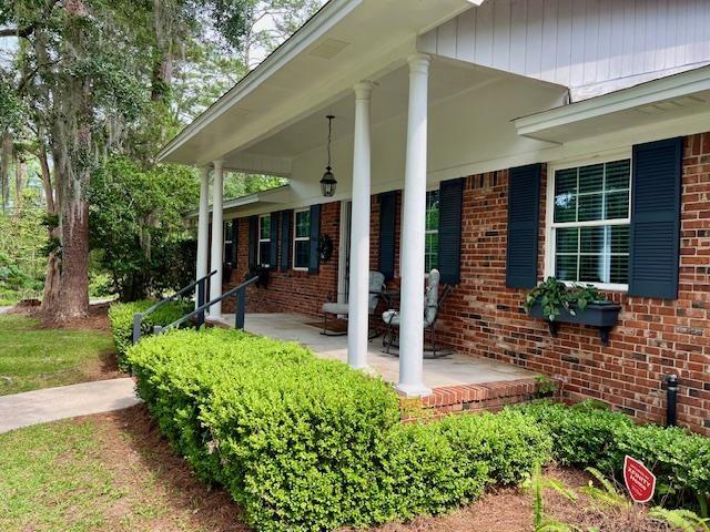 2401 Mexia Ave, Tallahassee, FL 32304 - entrance to property with a porch and brick siding