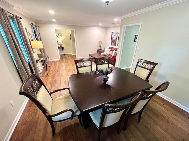 2401 Mexia Ave, Tallahassee, FL 32304 - dining room featuring wood finished floors, baseboards, ornamental molding, and recessed lighting